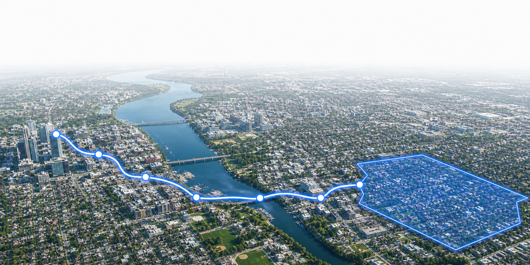 A bright aerial market view with a connected demand journey crossing a river into a defined Territory Store market